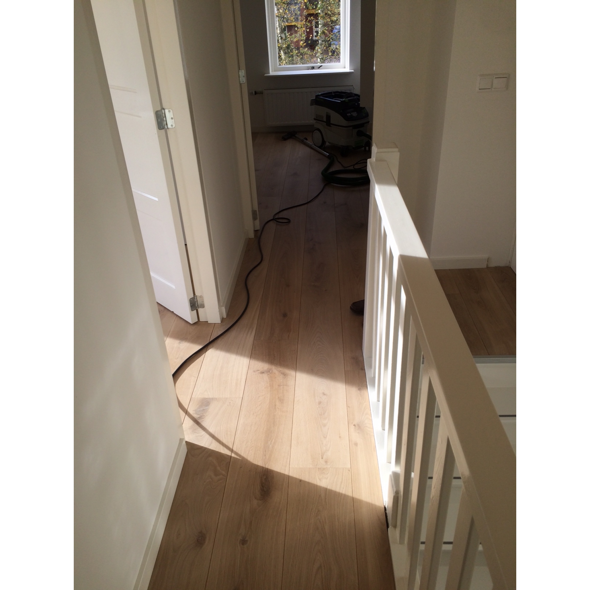 Eiken multiplank/lamelparket op de verdieping doorgelegd in Haren